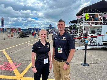 Drs. Joshua Mastenbrook EMS Fellowship alumna Kimberly Avery at the Michigan International Speedway NASCAR race to learn first-hand about mass gathering prehospital medical care operations, logistics, and planning