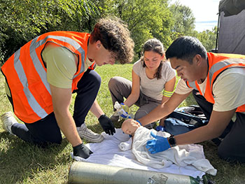 Students completing a simulated emergency during MFR Capstone Day 2025