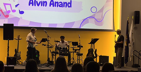 M4 Tyler Ulrich performs with the band "Cytokine Storm" at the 9th Annual HeART of WMed